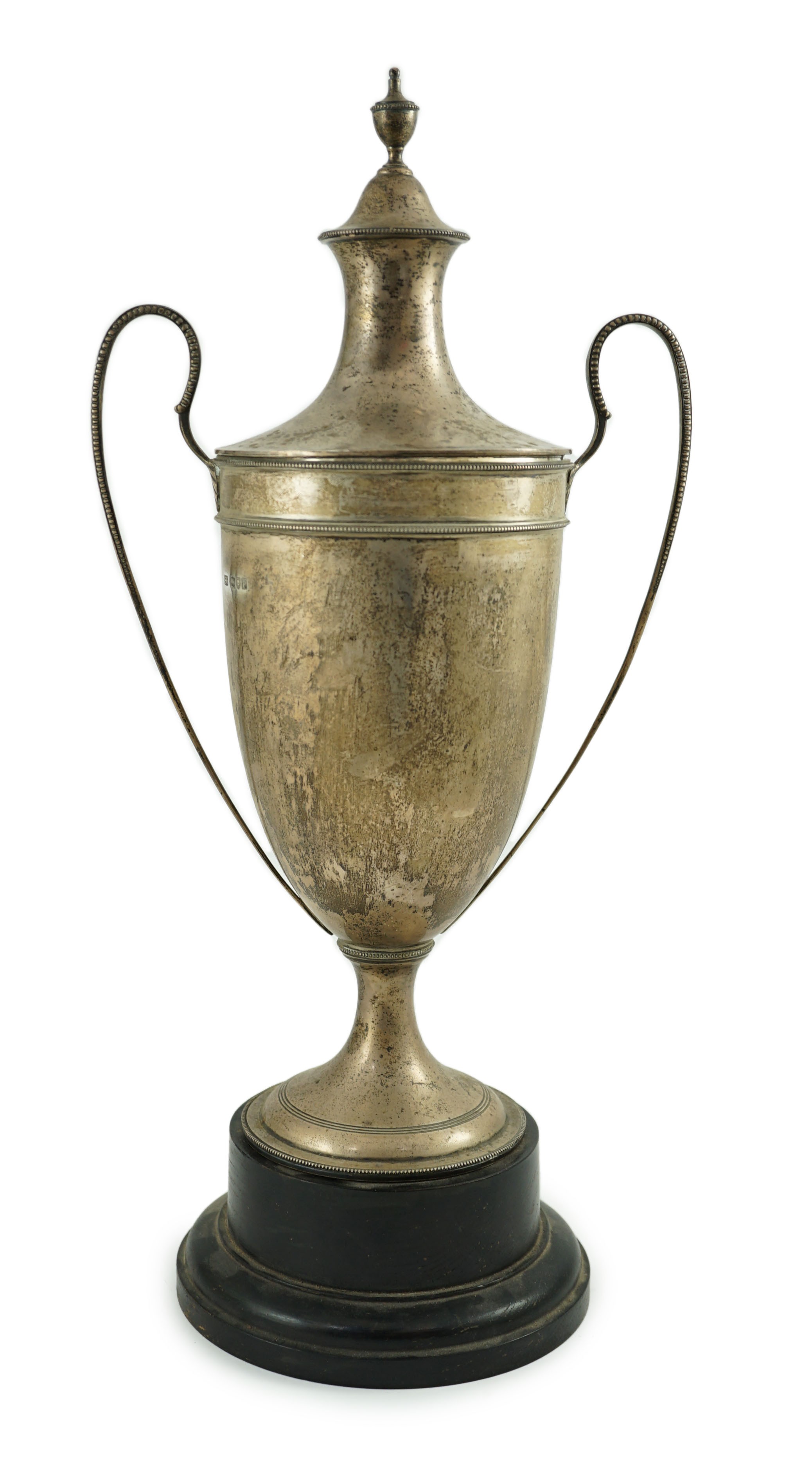 A George V silver two handled cup and cover by Sebastian Garrard